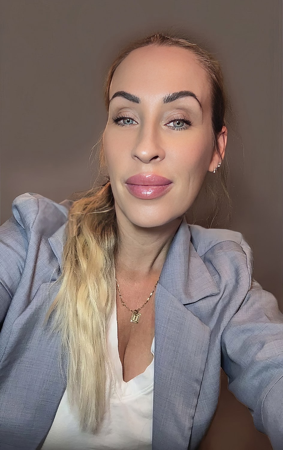 Woman smiling at Ocean Drive Med Spa.