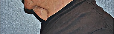 Profile view of person wearing a black shirt.