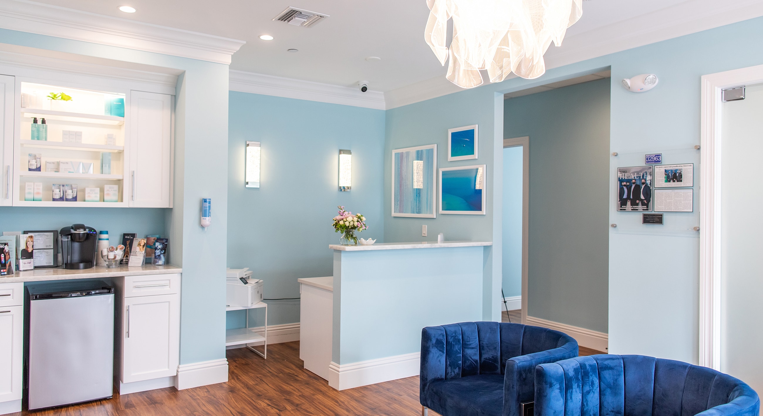 Modern reception area with blue accents.