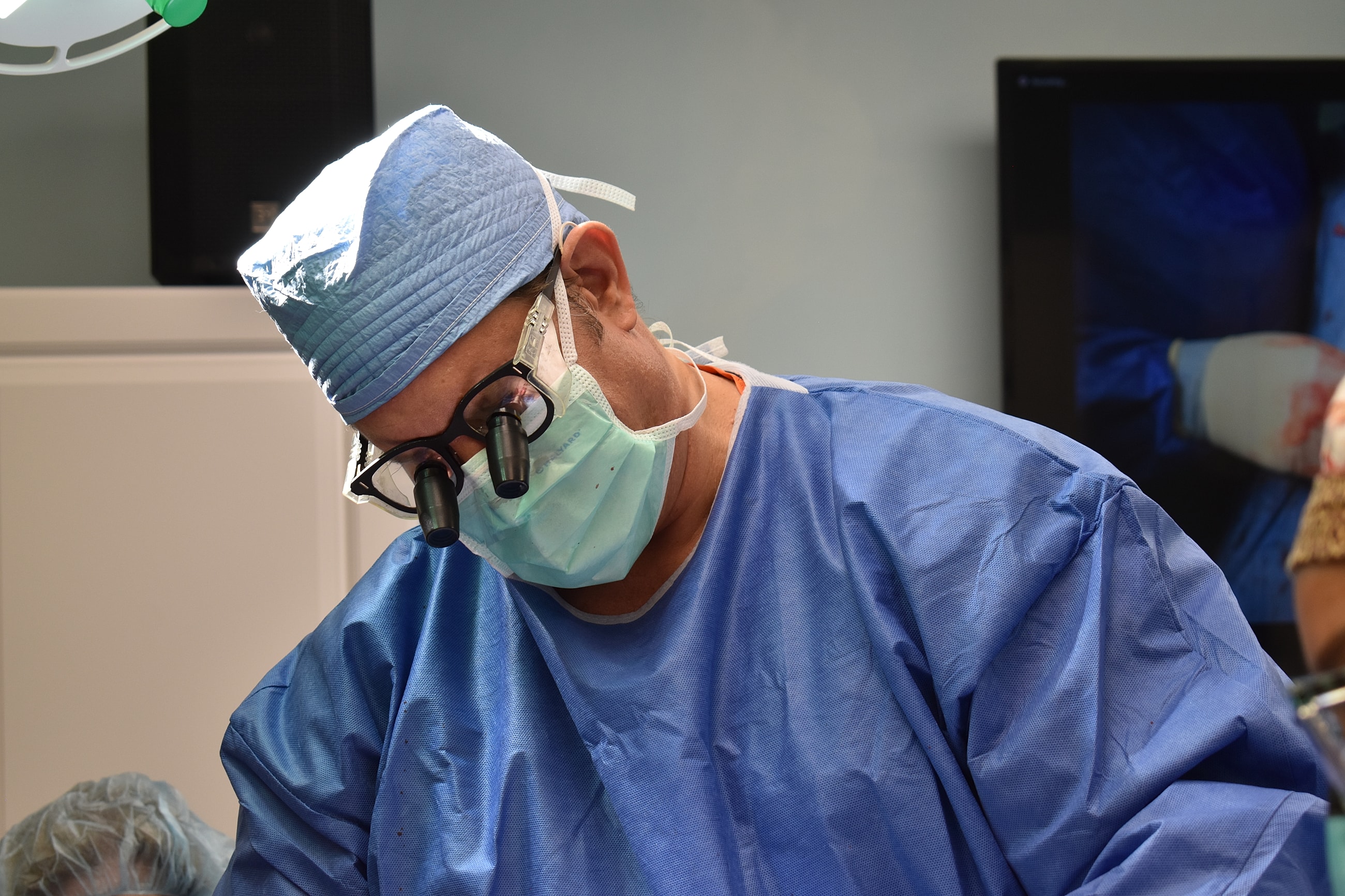 Medical team posing together in scrubs.