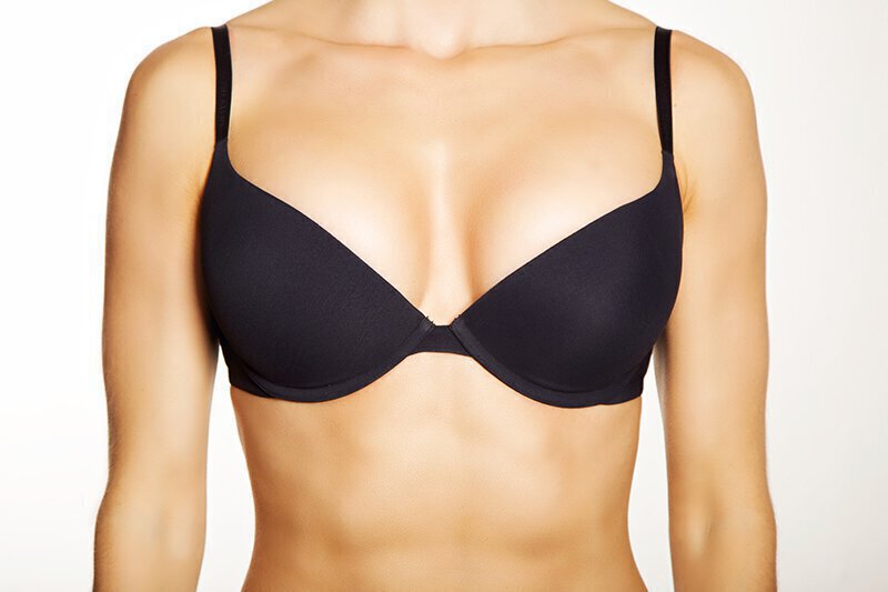 woman's torso wearing black bra