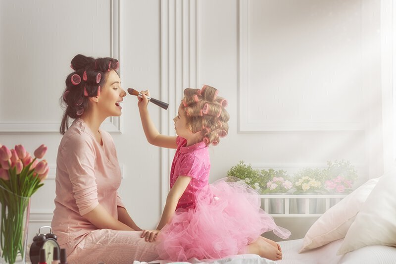 Woman sitting with child