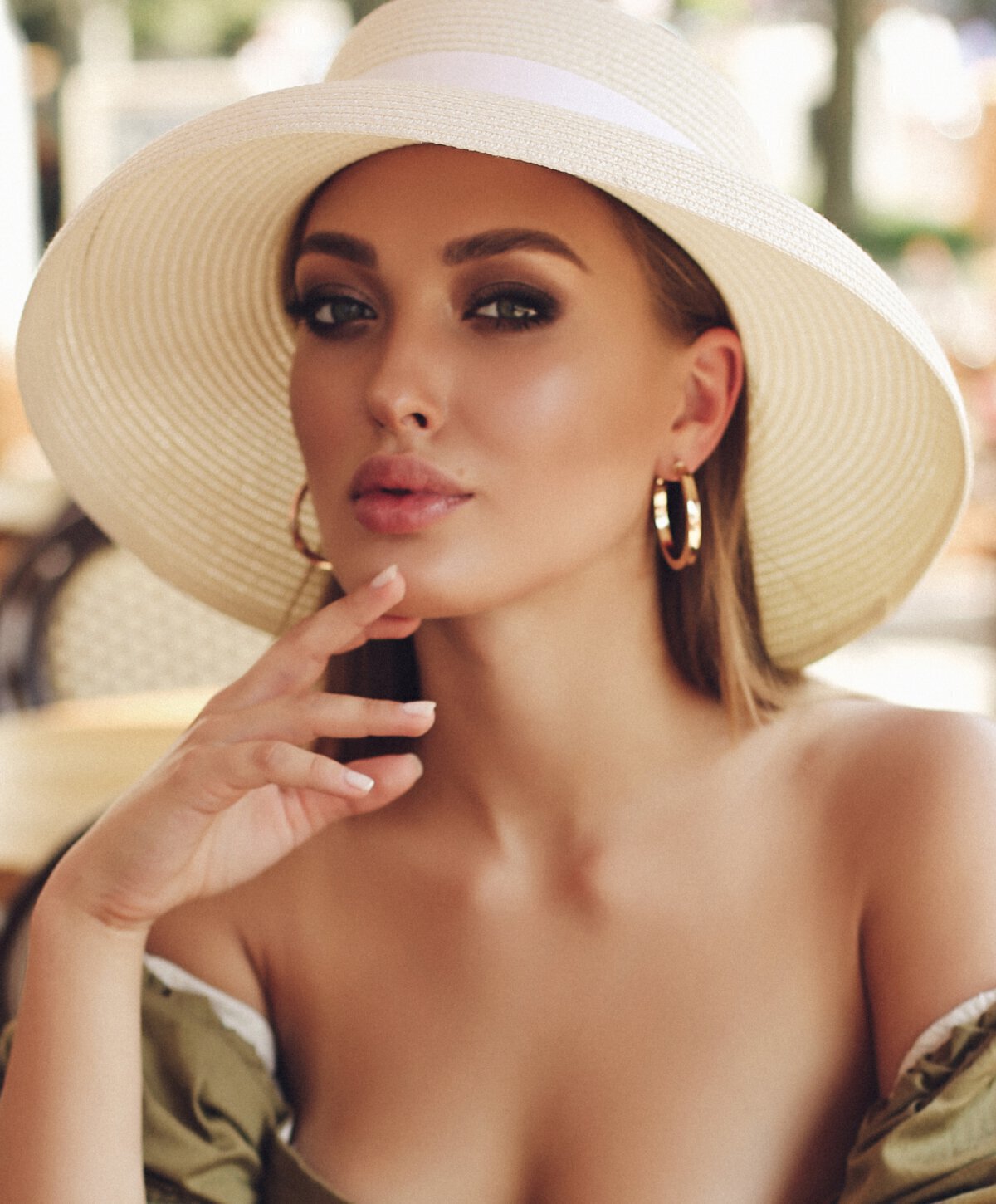 Vero Beach facial filler model wearing hat