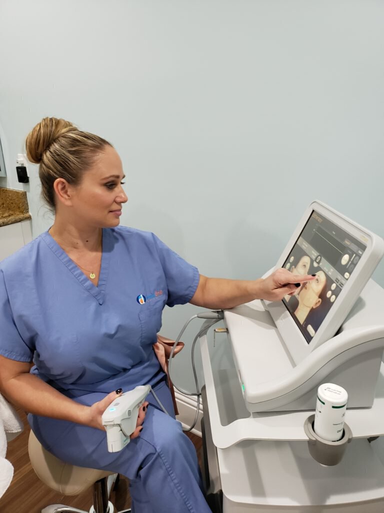 Vero Beach practitioner using skin rejuvenation machine