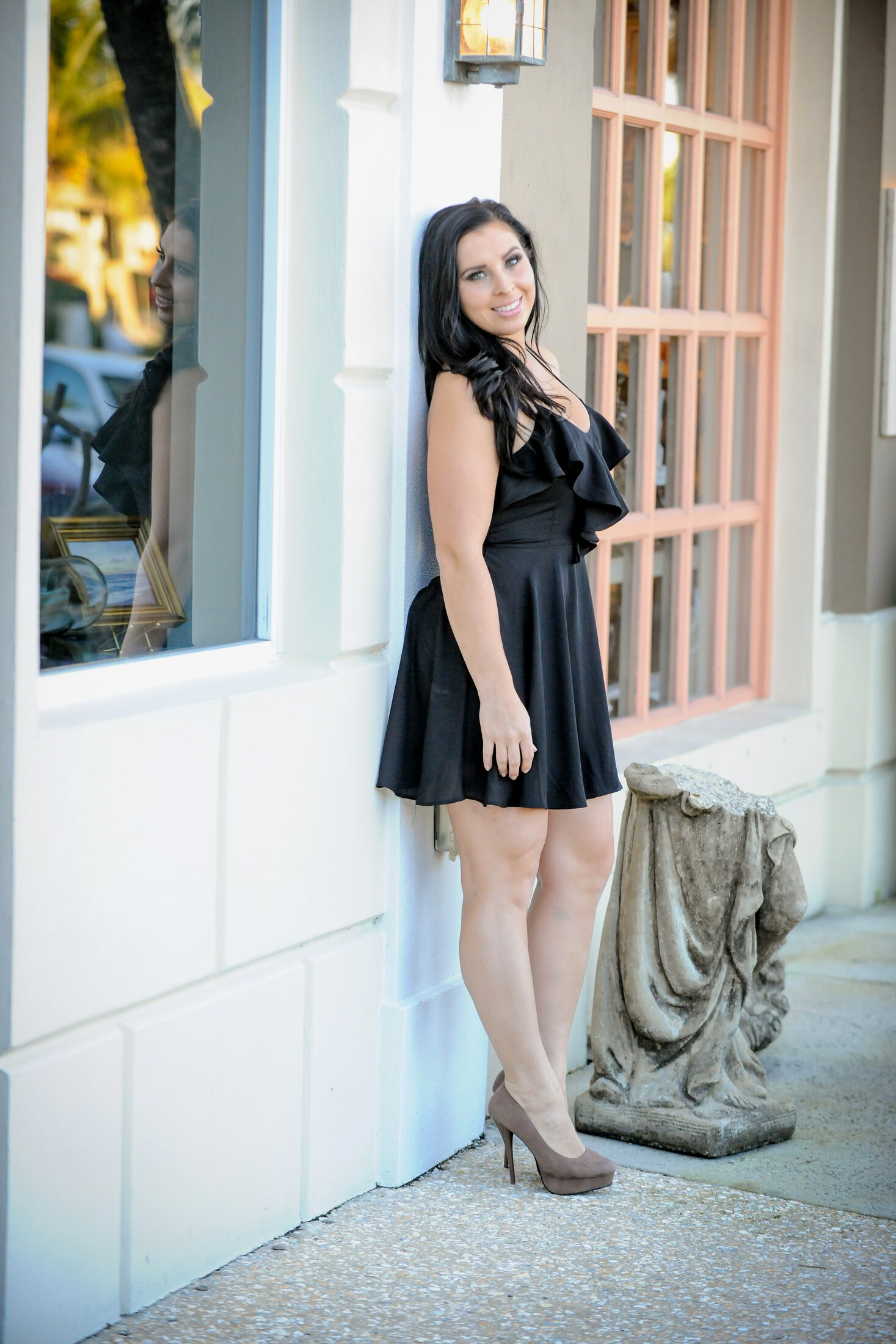 Vero Beach Breast Enhancement patient wearing a dress