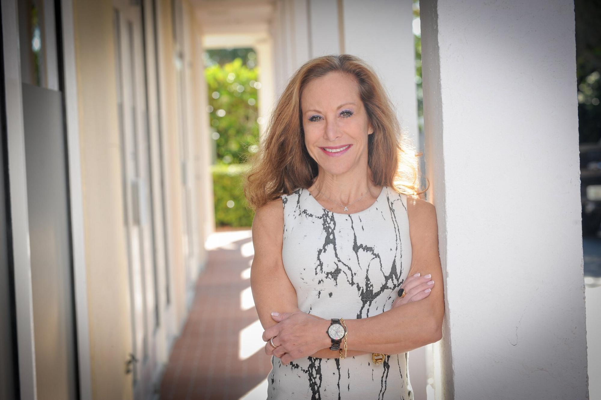 Vero Beach Breast Augmentation Revision patient crossing her arms
