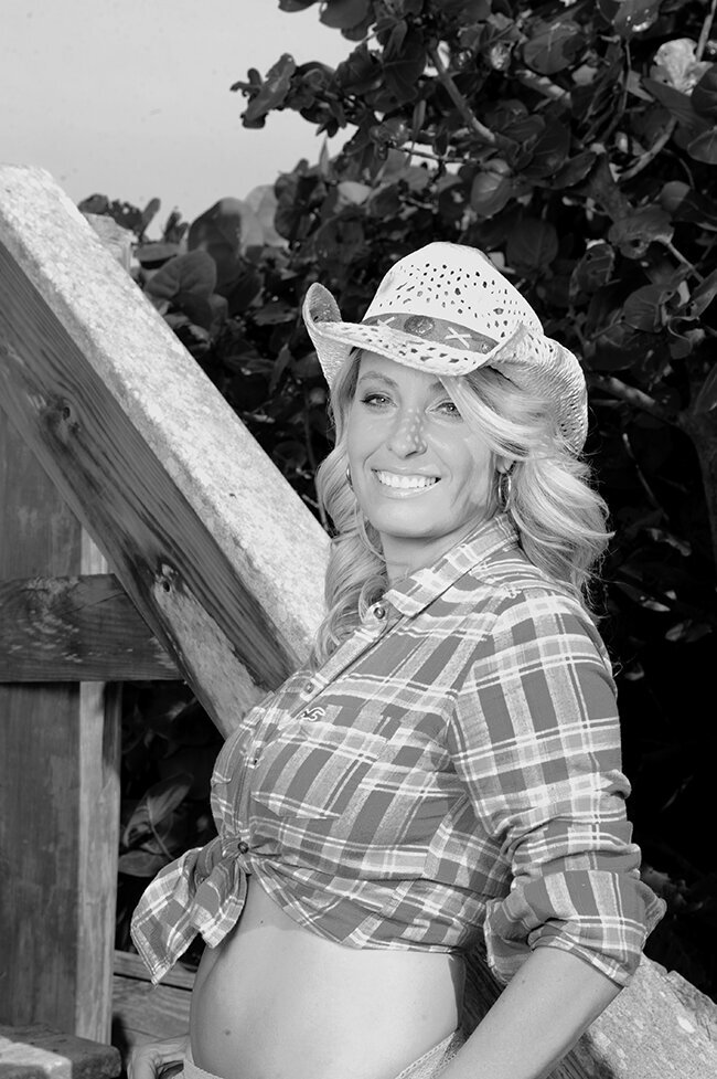 Ocean Drive Plastic Surgery Breast lift patient wearing a hat