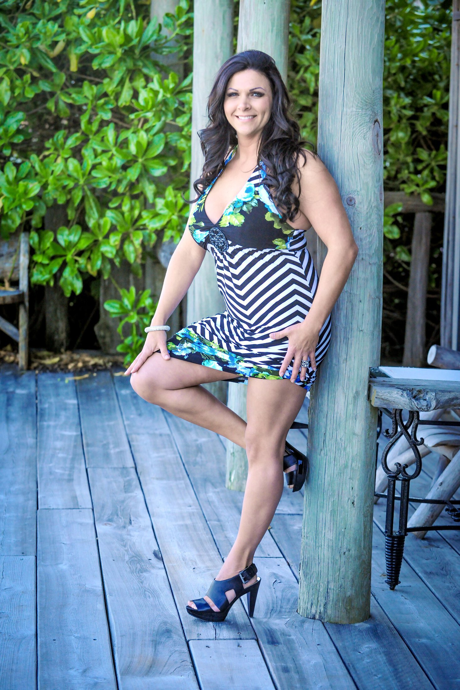 Ocean Drive Plastic Surgery Breast Revision patient in a dress