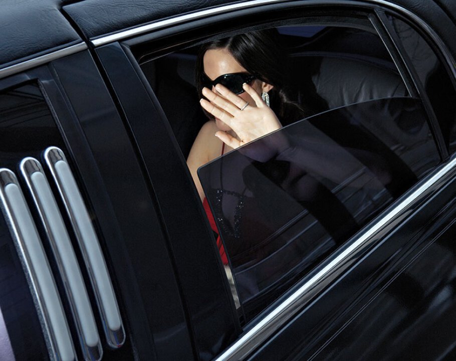 Famous woman in a car